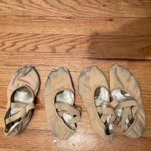 Used Capezio ballet flat shoes. Very worn condition, holes in the toes, tan.